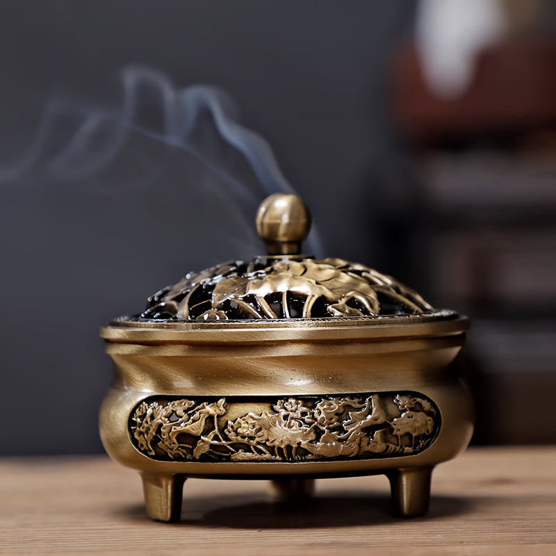 Elegant brass incense burner set with intricate designs and smoke rising for aromatic experiences