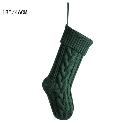 Green cable knit Christmas stockings measuring 18 inches for holiday decorating