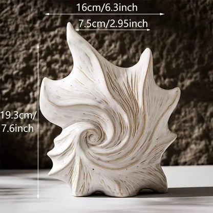 Nutshell CAPIRON Ceramic Conch Vase in white with textured swirl design and natural finish
