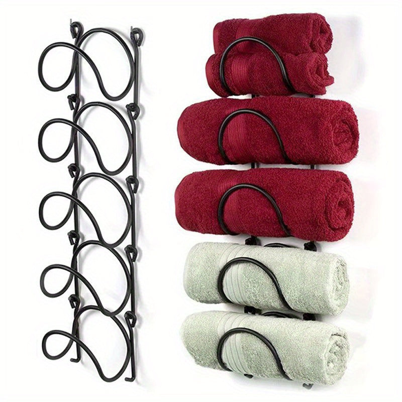 Nutshell cast iron towel racks with decorative swirls, perfect for organizing towels