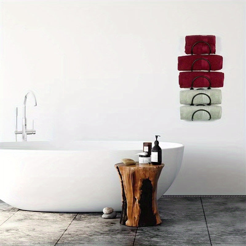 Nutshell bathroom organiser featuring stylish cast iron towel racks for elegant towel storage