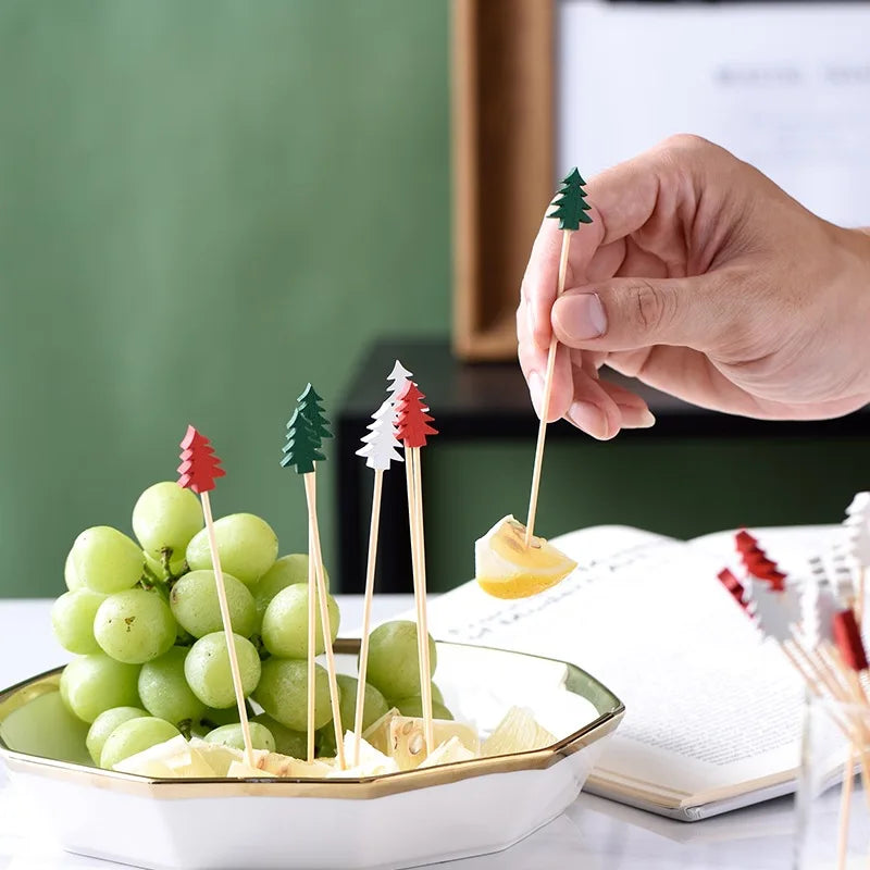 Christmas bamboo fruit sticks with decorative tree designs, perfect for holiday fruit platters