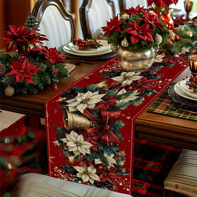 Festive Christmas bells table runner with poinsettias on a beautifully set dining table