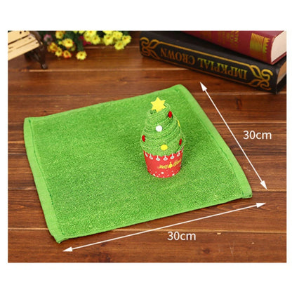 Christmas cake shaped hand towels in festive green with a decorative Christmas tree design