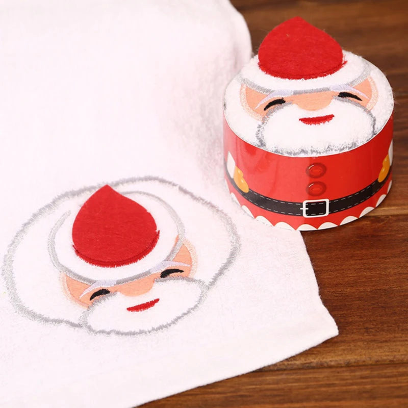 Christmas cake shaped hand towels featuring a Santa design for festive kitchen decor