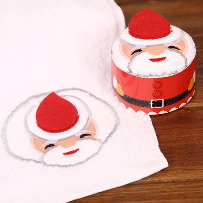 Christmas cake shaped hand towels featuring a Santa design for festive kitchen decor