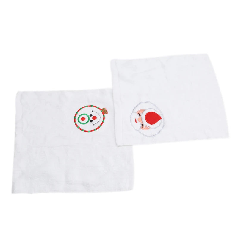 Christmas cake shaped hand towels featuring festive snowman and Santa designs for holiday decor