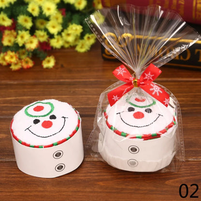 Christmas cake shaped hand towels featuring a smiling snowman design, perfect for holiday gifts