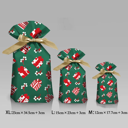 Nutshell Christmas candy gift bags in three sizes with festive green design and gold ribbon accents