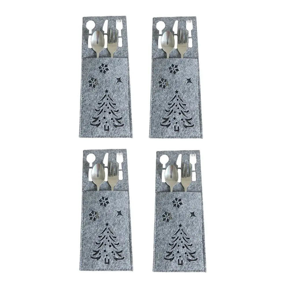 Set of four gray Christmas cutlery holders with tree and star designs for festive dining