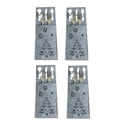 Set of four gray Christmas cutlery holders with tree and star designs for festive dining