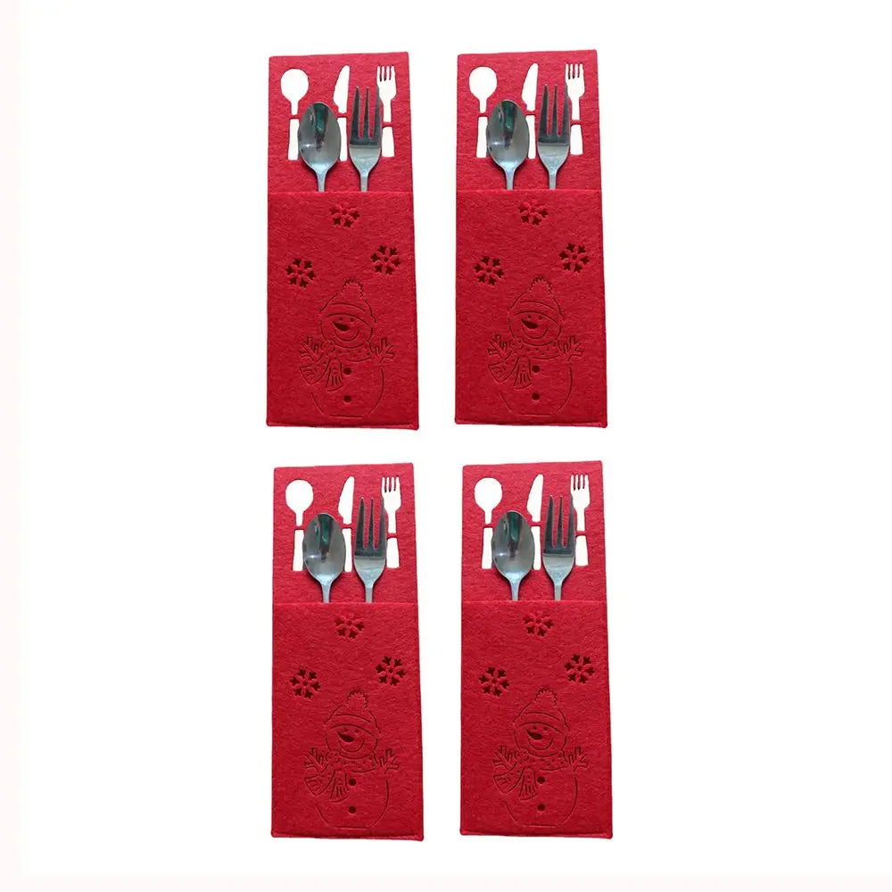Set of four red Christmas cutlery holders with festive designs for holiday dining tables