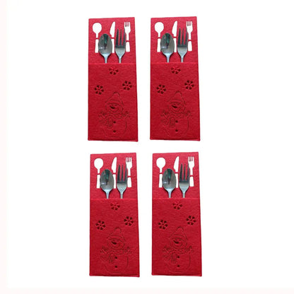 Set of four red Christmas cutlery holders with festive designs for holiday dining tables