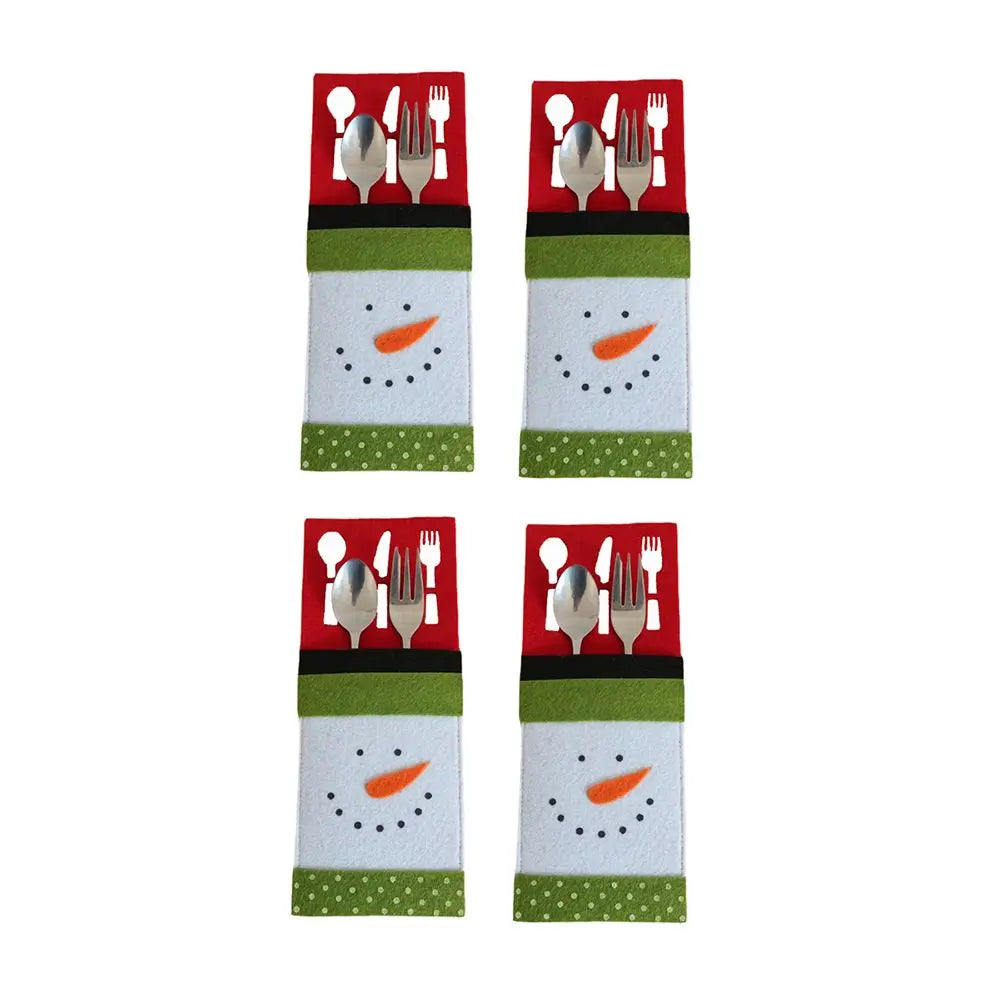 Set of four Christmas cutlery holders featuring snowman design for festive table settings