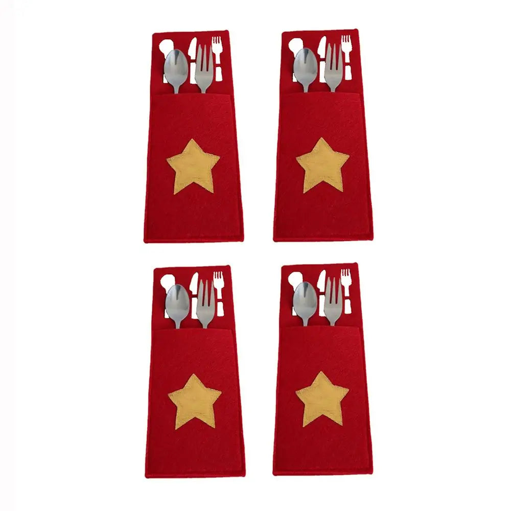 Set of four red Christmas cutlery holder with star design for festive table settings