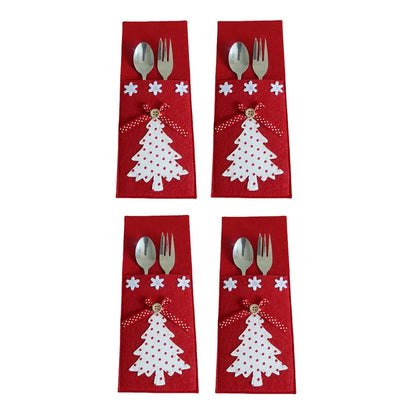 Set of four Christmas cutlery holder with tree design and decorative accents for festive table settings