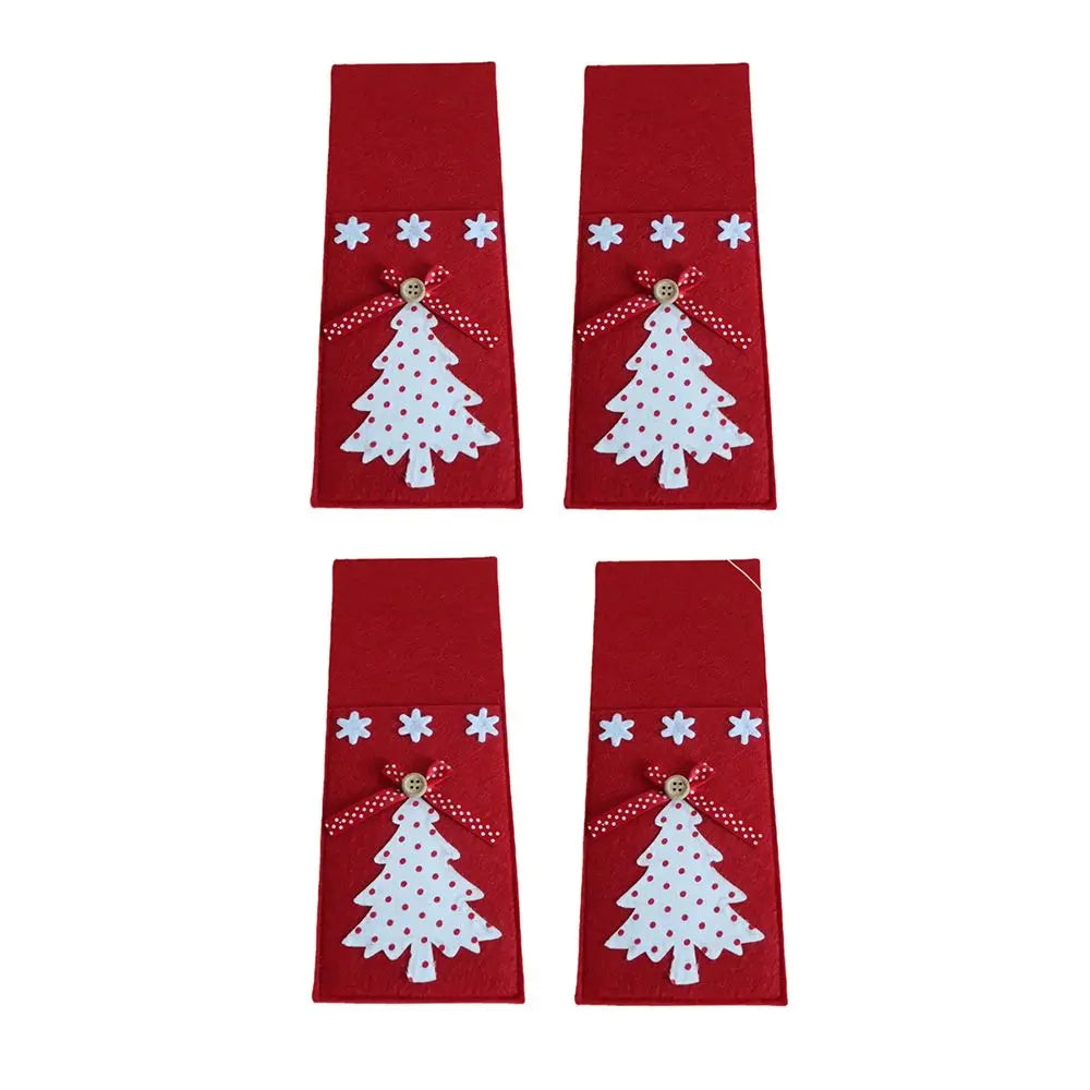 Set of four Christmas cutlery holders featuring decorated trees and festive embellishments