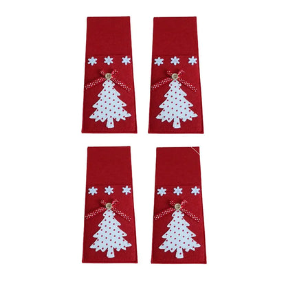 Set of four Christmas cutlery holders featuring decorated trees and festive embellishments