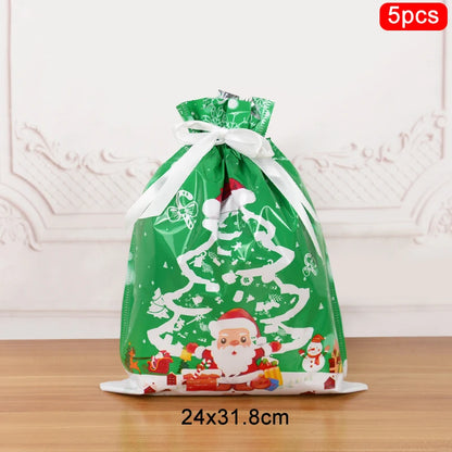 Set of 5 Christmas drawstring gift bags in green with festive Santa and tree design, 24x31.8cm size