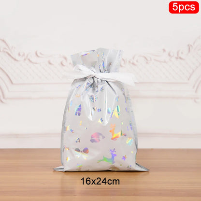 Set of 5 Christmas drawstring gift bags in silver with colorful designs for holiday gifting