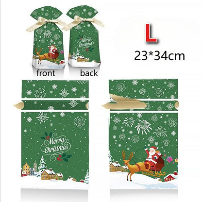 Christmas drawstring gift bags large in festive green with Santa and snowflakes, size 23x34cm