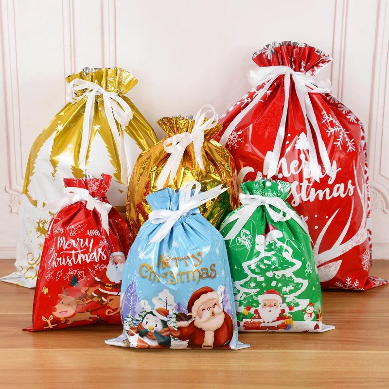 Set of colorful Christmas drawstring gift bags featuring festive designs for holiday gifting