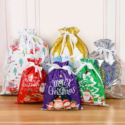 Colorful Christmas drawstring gift bags featuring festive designs for holiday gift wrapping