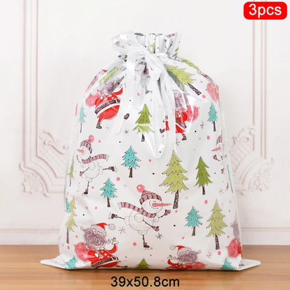 Set of 3 Christmas drawstring gift bags featuring festive snowmen and trees for holiday gifting