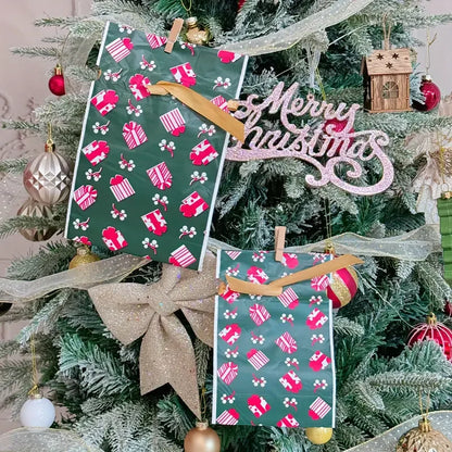 Christmas Drawstring Gift Bags with Ribbon featuring festive designs on a decorated tree