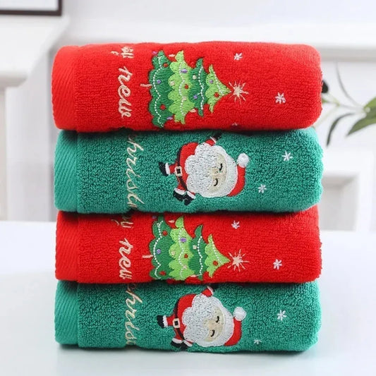 Stack of colorful Christmas Face Towels featuring Santa and Christmas tree designs