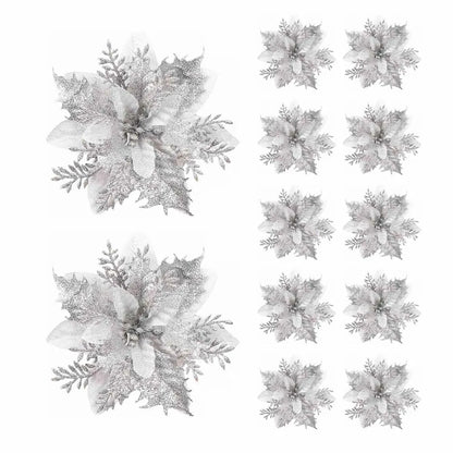 Silver Christmas flower ornaments arranged in a decorative pattern for festive holiday decor