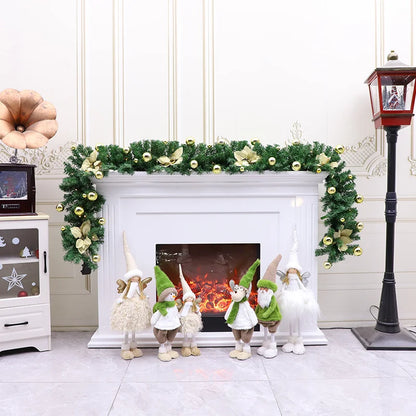 Festive Christmas Garland draped over a white mantel with decorative gnomes and a cozy fireplace