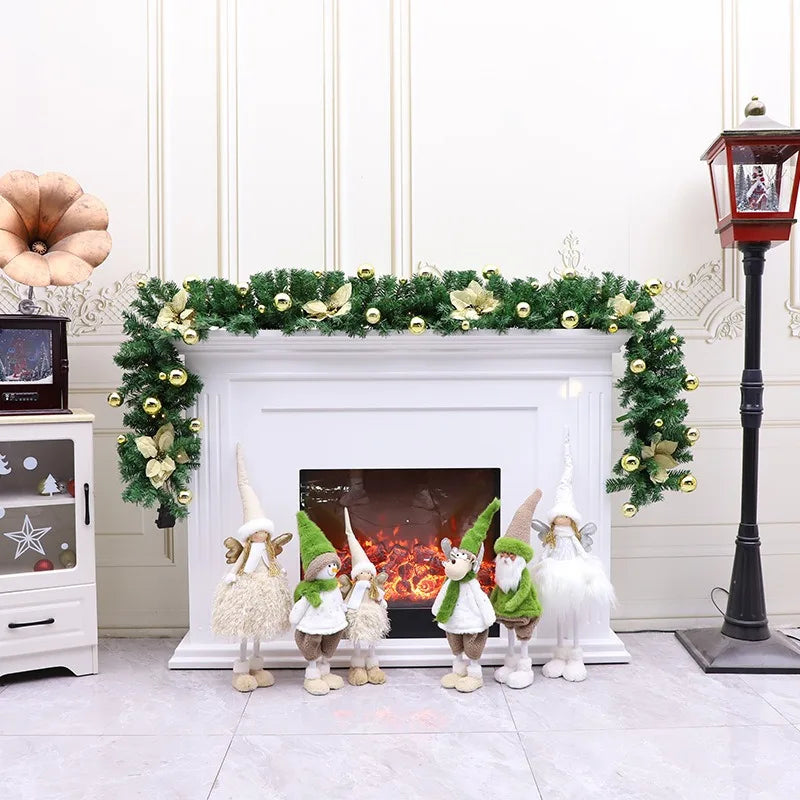 Nutshell Christmas Garland decorated on a fireplace with whimsical gnome figures and festive accents