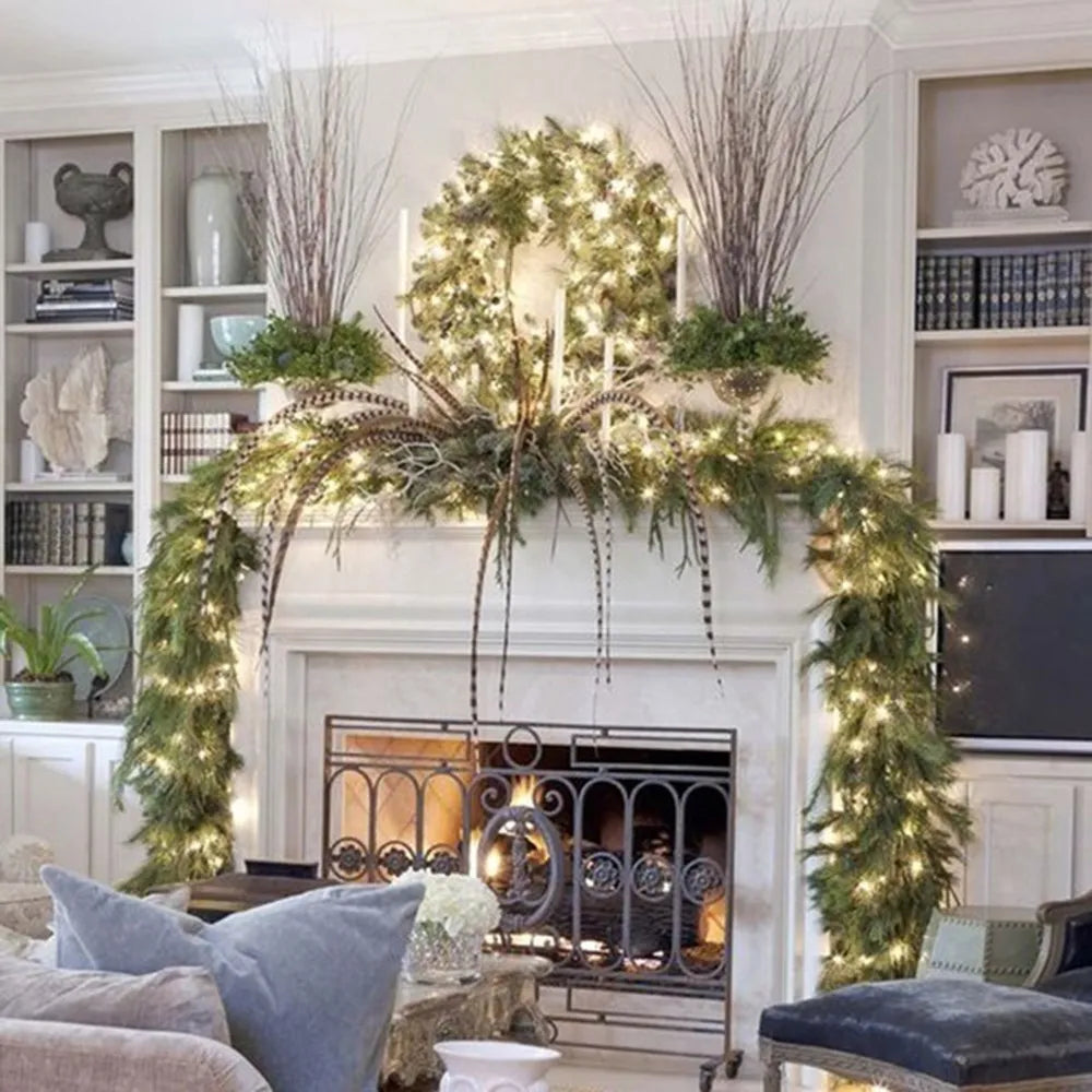 Elegant Christmas garland with lights adorning a stylish fireplace mantel with decorative elements