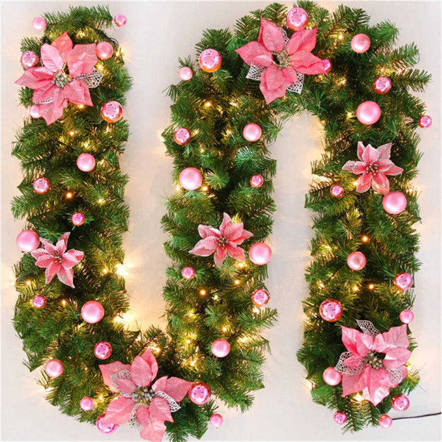 Nutshell Christmas garland with lights featuring pink flowers and ornaments for festive decor