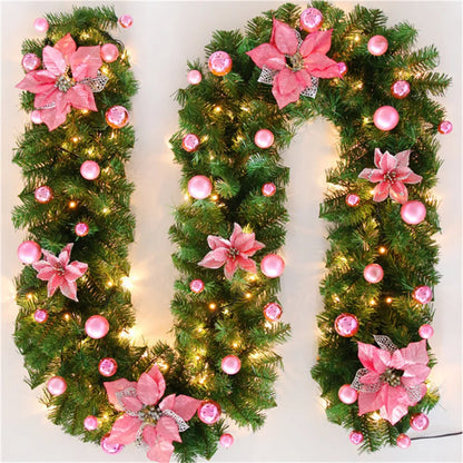 Nutshell Christmas garland with lights featuring pink flowers and ornaments for festive decor