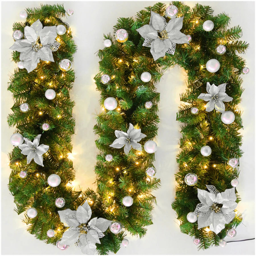 Nutshell Christmas garland with lights featuring silver flowers and decorative ornaments