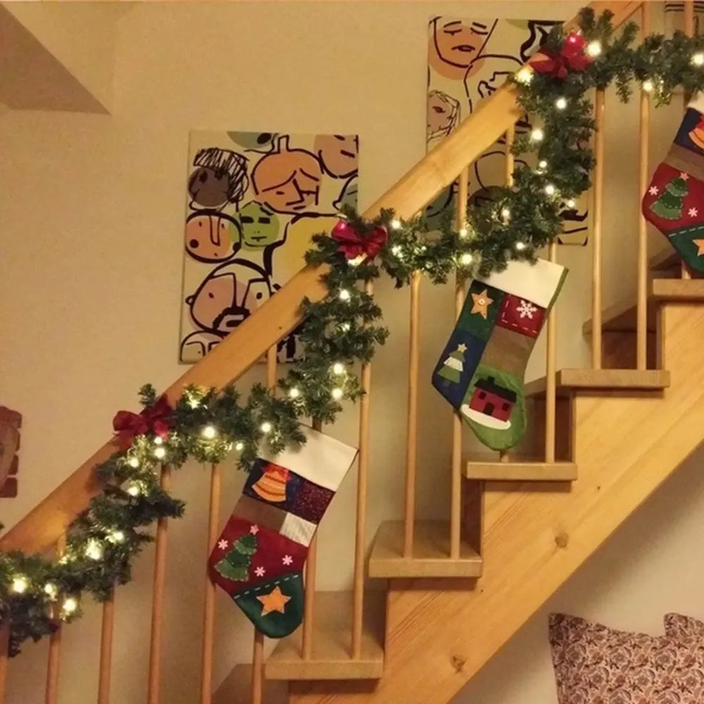 Nutshell Christmas garland with lights elegantly draped on a staircase with colorful holiday stockings