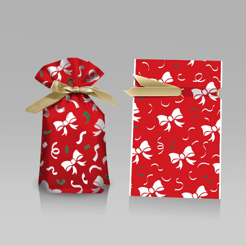 Two festive Christmas gift bags with drawstring featuring red and white bow designs
