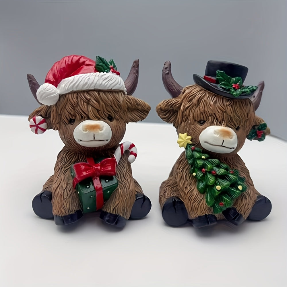 Christmas Highland cow decor featuring two cute cow figurines in festive hats and decorations