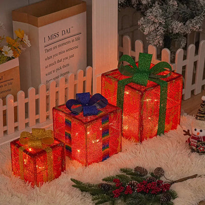 Nutshell Christmas light up gift boxes in various sizes with colorful ribbons for festive decorations