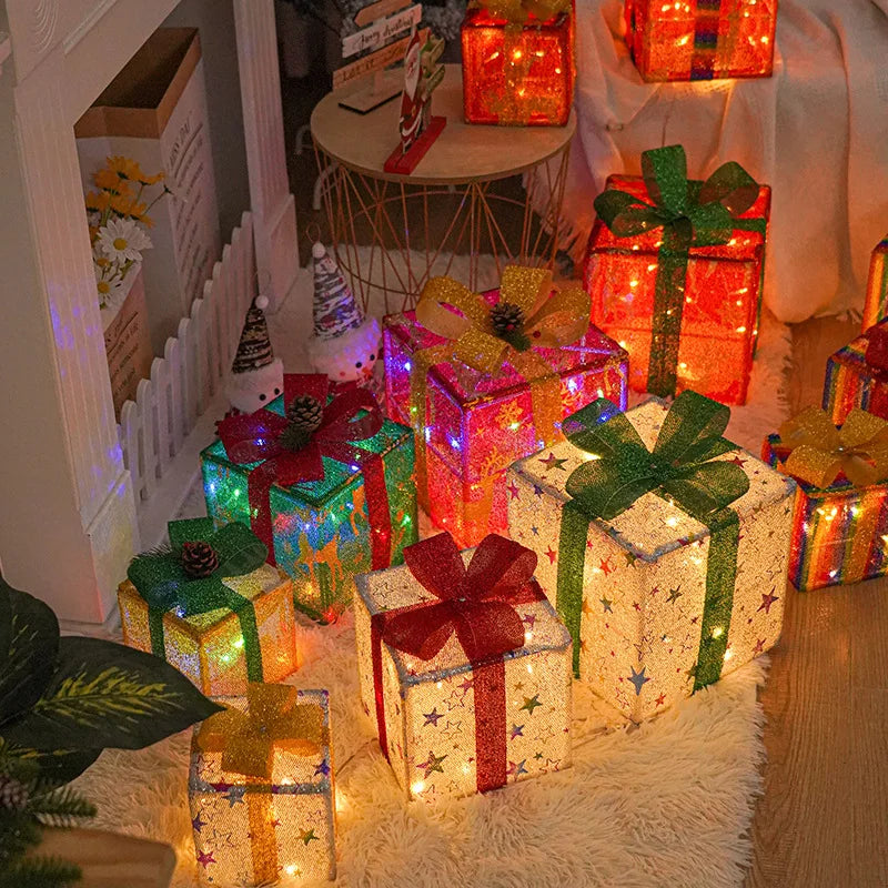 Colorful Christmas light up gift boxes arranged beautifully with bright lights and festive decor