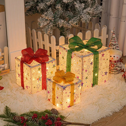 Decorative Christmas light up gift boxes in varying sizes with colorful bows for festive holiday decor