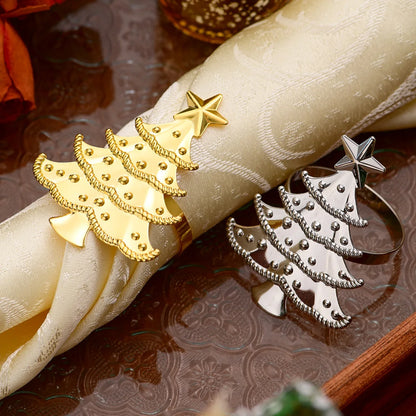 Gold and silver Christmas napkin ring set featuring festive tree designs for holiday dining decor