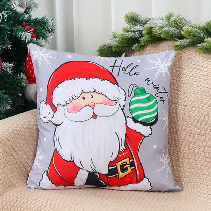 Christmas Pillow Covers featuring a cheerful Santa holding a green ornament, perfect for festive decor