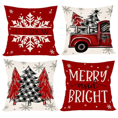 Set of festive Christmas Pillow Covers featuring snowflakes, trucks, and holiday messages in red and cream