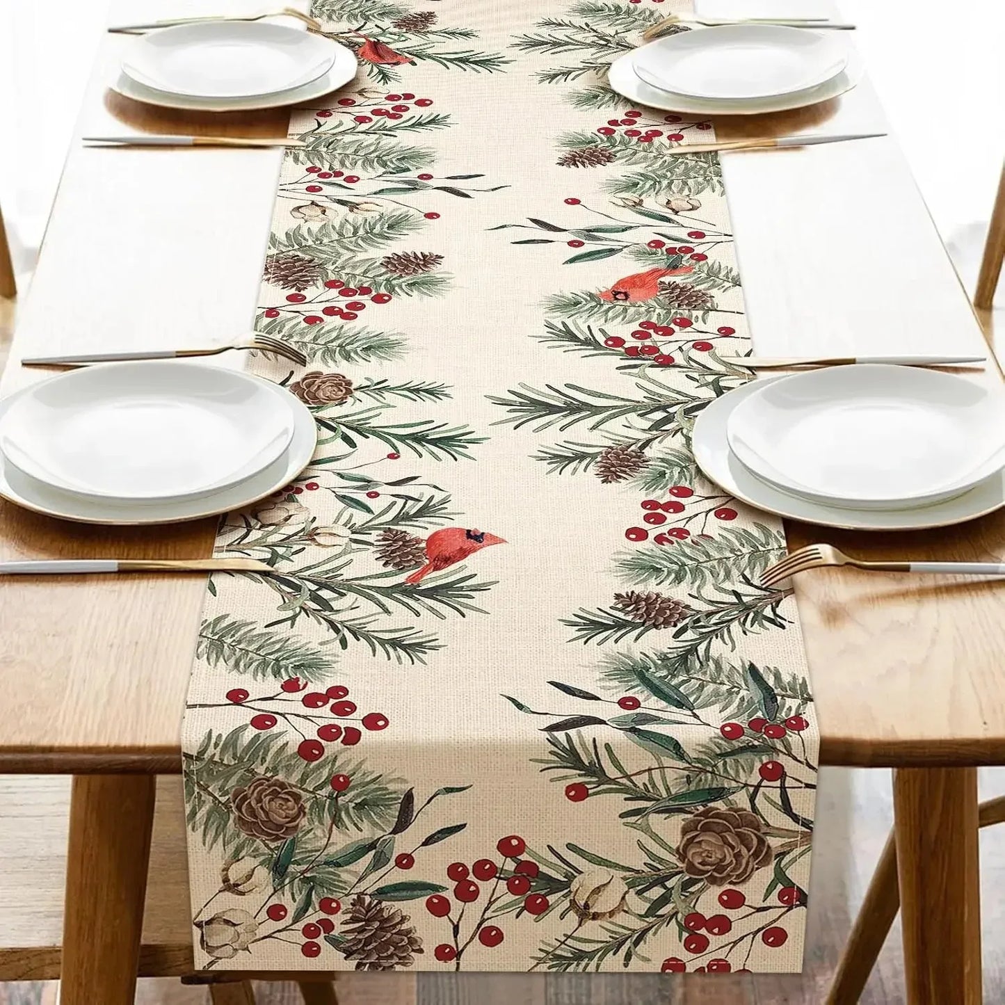 Christmas Pine Needle Branches Linen Table Runner with Red Cardinals and Pine Cones on a Wood Table