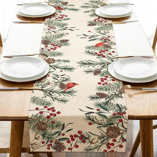 Christmas Pine Needle Branches Linen Table Runner with Red Cardinals and Pine Cones on a Wood Table