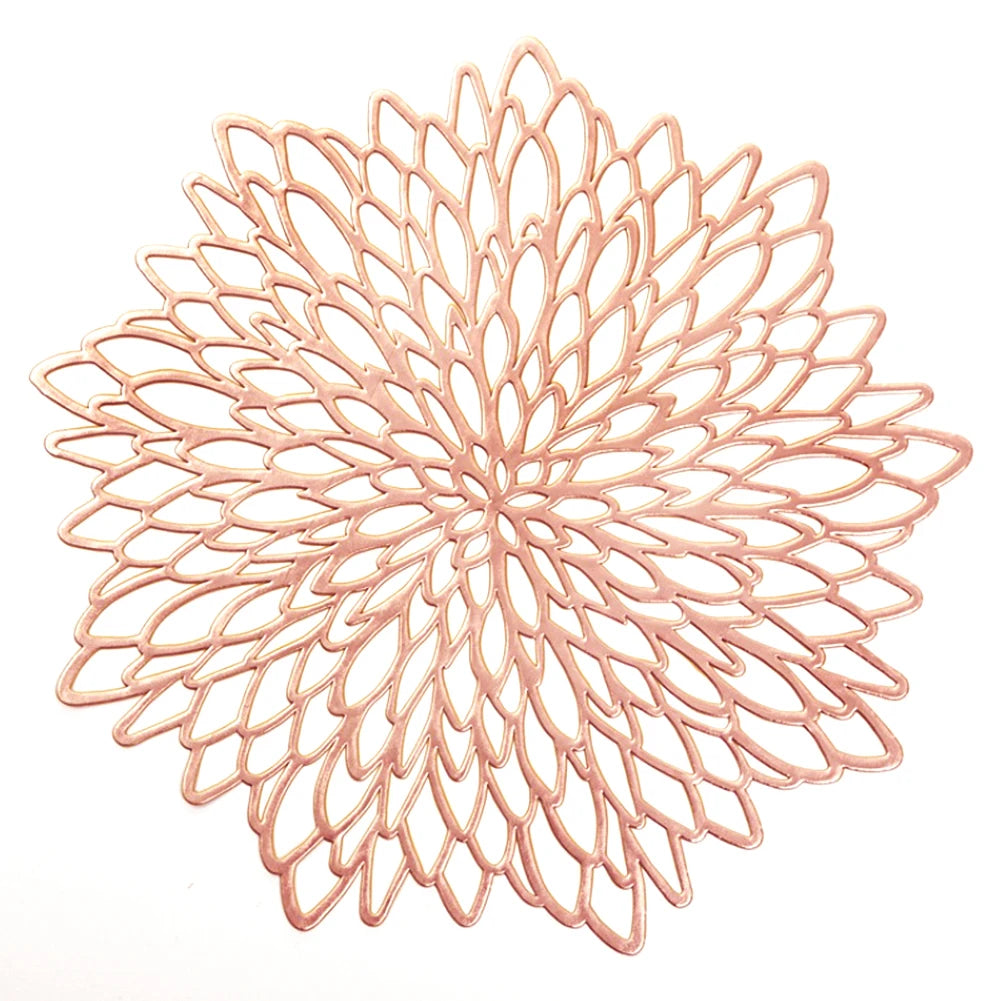 Rose gold decorative Christmas placemats in a floral design for festive dining tables