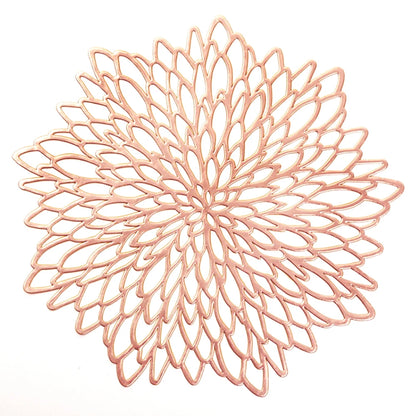Rose gold decorative Christmas placemats in a floral design for festive dining tables